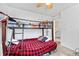 Bedroom with a cozy bunk bed and carpeted flooring at 9484 E 108Th Ave, Commerce City, CO 80640