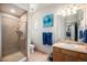 Stylish bathroom features a shower, modern fixtures, and granite countertops on the vanity at 1155 S Balsam St, Lakewood, CO 80232