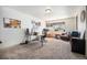Functional office with a desk, comfortable chair, window, and a comfortable armchair at 1155 S Balsam St, Lakewood, CO 80232