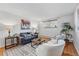 Warm and inviting living room featuring cozy seating, a stylish rug, and a calming ambiance, perfect for relaxing after a long day at 3047 W 47Th Ave # 112, Denver, CO 80211