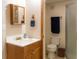 Cozy bathroom featuring a classic vanity and a well-maintained shower area at 7328 S Kit Carson St, Centennial, CO 80122