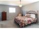 Cozy bedroom with a decorative bed frame and soft, neutral accents at 7328 S Kit Carson St, Centennial, CO 80122