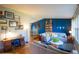 Inviting living room featuring hardwood floors, comfortable seating, and stylish decor at 7328 S Kit Carson St, Centennial, CO 80122