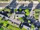 Great aerial perspective of this building, a parking area, and nearby residential areas at 17505 E Mansfield Ave # 1411L, Aurora, CO 80013