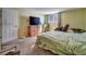 Spacious bedroom featuring soft carpet, a window providing natural light, and neutral paint at 17505 E Mansfield Ave # 1411L, Aurora, CO 80013