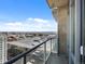 Balcony with glass railings offering panoramic city views on a sunny day at 891 14Th St # 2314, Denver, CO 80202