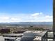 Expansive city and mountain views from an upper-level balcony, ideal for enjoying the scenery at 891 14Th St # 2314, Denver, CO 80202