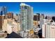 Exterior view of a modern high-rise building featuring city views and glass balconies at 891 14Th St # 2314, Denver, CO 80202