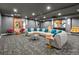 Modern game room featuring a large sectional sofa and a flat-screen television at 891 14Th St # 2314, Denver, CO 80202