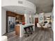 Modern kitchen with stainless steel appliances, a large island, and stylish dining area at 891 14Th St # 2314, Denver, CO 80202