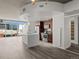 Open-concept kitchen with stainless steel appliances and island with pendant lights at 891 14Th St # 2314, Denver, CO 80202