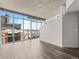 Bright, open living space features large windows, hardwood floors, and modern architectural design at 891 14Th St # 2314, Denver, CO 80202