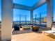 Outdoor terrace featuring seating around a cozy gas fire pit and panoramic city views at 891 14Th St # 2314, Denver, CO 80202