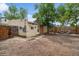 Backyard with patio, mature trees and landscaping at 113 S 4Th Ave, Brighton, CO 80601