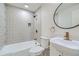 Beautifully updated bathroom featuring patterned tile, gold fixtures, and modern design at 5050 Steele St, Denver, CO 80216