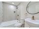 Charming bathroom features a white vanity, designer tiled shower, and modern fixtures at 5050 Steele St, Denver, CO 80216