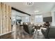 Bright and airy living room featuring an open floor plan, modern furnishings and stylish decor throughout at 5050 Steele St, Denver, CO 80216