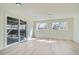 Bright and spacious living room area with sliding glass doors that leads out to the backyard at 5050 Steele St, Denver, CO 80216