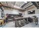 Basement with granite table, work bench and tools, offering space for hobbies and storage at 18103 House Finch Ln, Parker, CO 80134