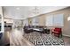 Open-concept floor plan with living room leading to the kitchen and dining area at 18103 House Finch Ln, Parker, CO 80134