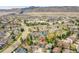 Beautiful aerial view of the neighborhood and surrounding mountainous terrain at 10866 W Half Moon Pass, Littleton, CO 80127