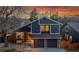 Charming two-story home with a brick and siding exterior and a two-car garage, showcasing its curb appeal at 10866 W Half Moon Pass, Littleton, CO 80127