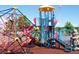 Community playground featuring climbing structures, slides, and play areas for children to enjoy outdoors at 10866 W Half Moon Pass, Littleton, CO 80127