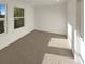 Bright bedroom features large windows and neutral carpet at 24955 E Roxbury Pl, Aurora, CO 80016