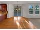 Dining area featuring hardwood floors and sliding glass doors to the outside deck at 24955 E Roxbury Pl, Aurora, CO 80016