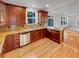 Well-equipped kitchen featuring wood cabinetry and stainless steel appliances at 24955 E Roxbury Pl, Aurora, CO 80016