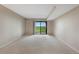 Unfurnished bedroom with sliding door to the backyard at 7160 W Stetson Pl # 27, Littleton, CO 80123