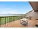 Exterior deck with seating area and beautiful lake views at 7160 W Stetson Pl # 27, Littleton, CO 80123