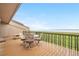 Inviting deck with outdoor seating and stunning views of the water at 7160 W Stetson Pl # 27, Littleton, CO 80123