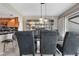 Dining area with modern lighting and a clear view of the kitchen at 7160 W Stetson Pl # 27, Littleton, CO 80123