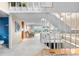 Open-concept interior with staircase, a full bathroom, and lake views at 7160 W Stetson Pl # 27, Littleton, CO 80123