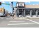 Street view of 'Crazy Mountain Brewery' with prominent signage and street-side parking at 1581 N Ogden St, Denver, CO 80218