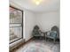 Charming porch area with outdoor seating and a decorative rug at 1581 N Ogden St, Denver, CO 80218