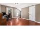 Spacious bedroom features a wooden floor, an office space, and a bright skylight at 34498 Forest Estates Rd, Evergreen, CO 80439