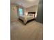 Comfortable bedroom with hardwood floors, queen bed, and bedside table at 34498 Forest Estates Rd, Evergreen, CO 80439