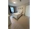 Bright bedroom featuring a white bed frame and dinosaur-themed bedding at 34498 Forest Estates Rd, Evergreen, CO 80439