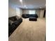 Relaxing living room with comfortable couches, a soft carpet, neutral colors, and many windows for ample light at 34498 Forest Estates Rd, Evergreen, CO 80439