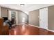 Office space featuring wood floors, a large window, and a comfortable desk setup at 34498 Forest Estates Rd, Evergreen, CO 80439