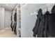 Spacious walk-in closet with built-in shelving and storage for clothing and accessories at 34498 Forest Estates Rd, Evergreen, CO 80439