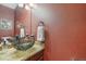 Unique bathroom with granite countertop and sink at 7513 Simms Ct, Arvada, CO 80005