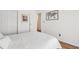 Cozy bedroom with white walls, carpet flooring and well-lit interior featuring two closets at 7513 Simms Ct, Arvada, CO 80005