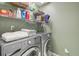 Efficient laundry area with modern washer and dryer at 7513 Simms Ct, Arvada, CO 80005