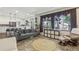 Open concept space with a living room area and access to the gourmet kitchen at 7513 Simms Ct, Arvada, CO 80005