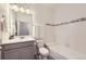 Bathroom featuring modern vanity, lighting and bathtub at 14700 E 104Th Ave # 1404, Commerce City, CO 80022