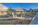 A beautiful community gazebo with stone accents offers a perfect space for outdoor gatherings and picnics on a manicured lawn at 14700 E 104Th Ave # 1404, Commerce City, CO 80022