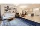 Spacious living area with modern decor, seamlessly connected to the kitchen and dining spaces, perfect for entertaining at 14700 E 104Th Ave # 1404, Commerce City, CO 80022